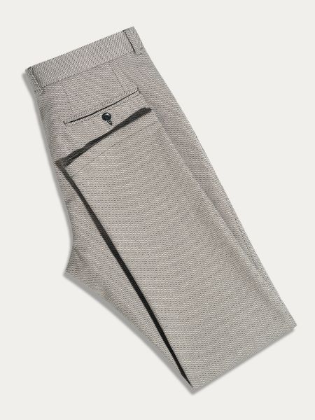 Szare bezpatkowe spodnie slim w czarny geometryczny wzór ENTERO