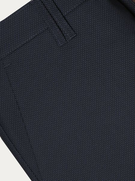 Granatowe spodnie garniturowe slim z delikatnym mikrowzorem  CALVADO 